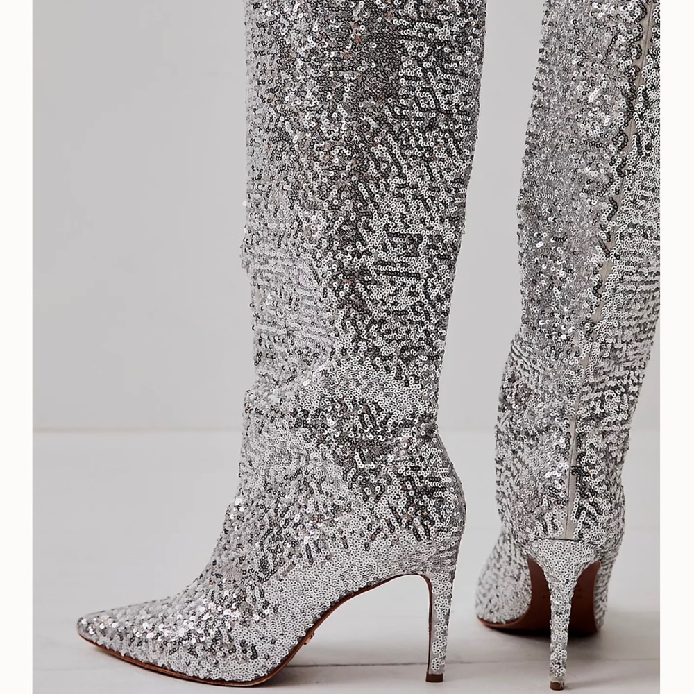 tall and embellished,boots shiny sequins allover and pointed with a thin heel.